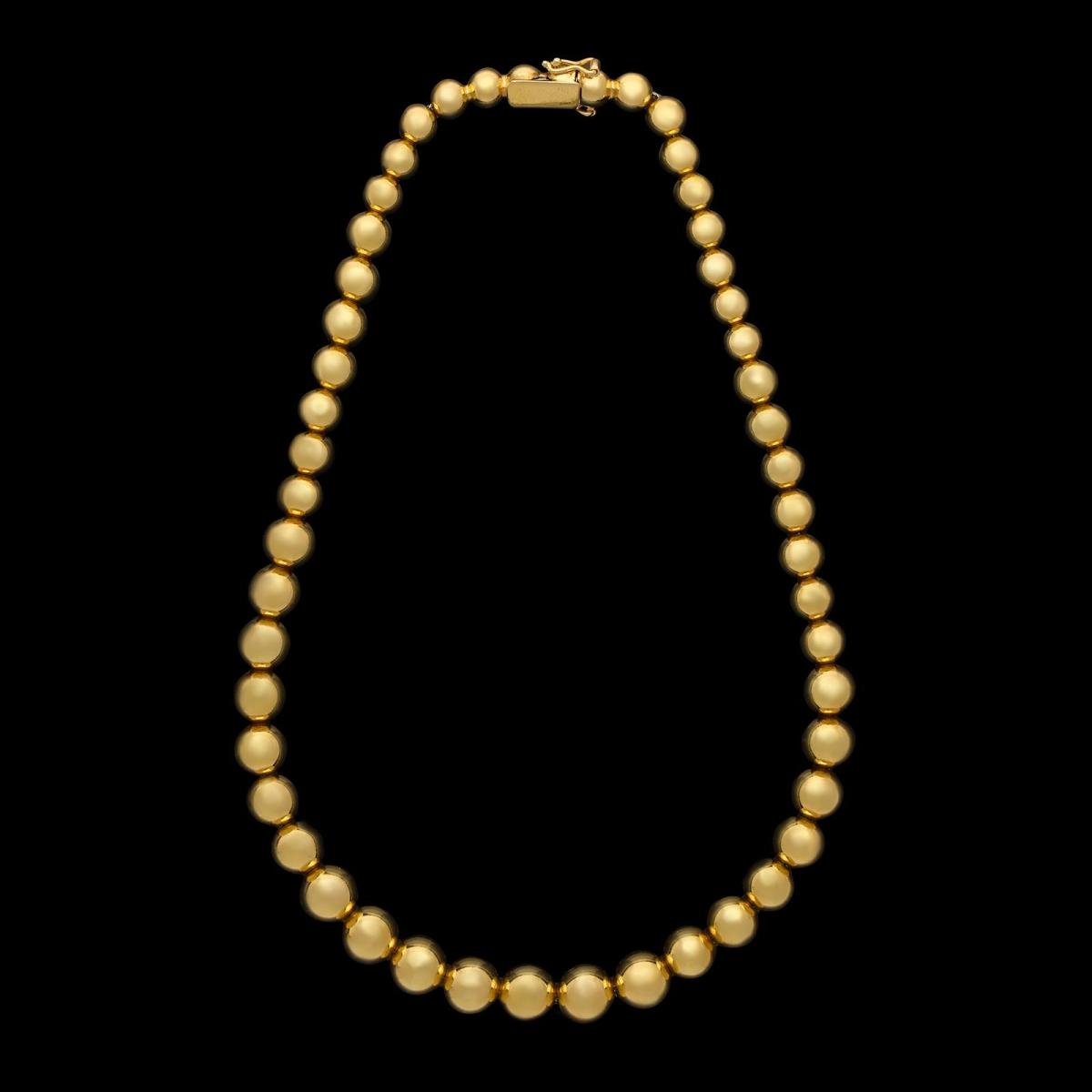 Tiffany & Co. An 18ct Gold Graduated Bead Necklace Circa 1980s