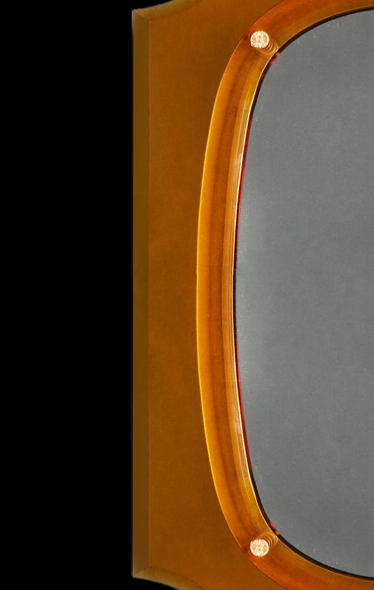 An Amber Glass Mirror After Fontana Arte