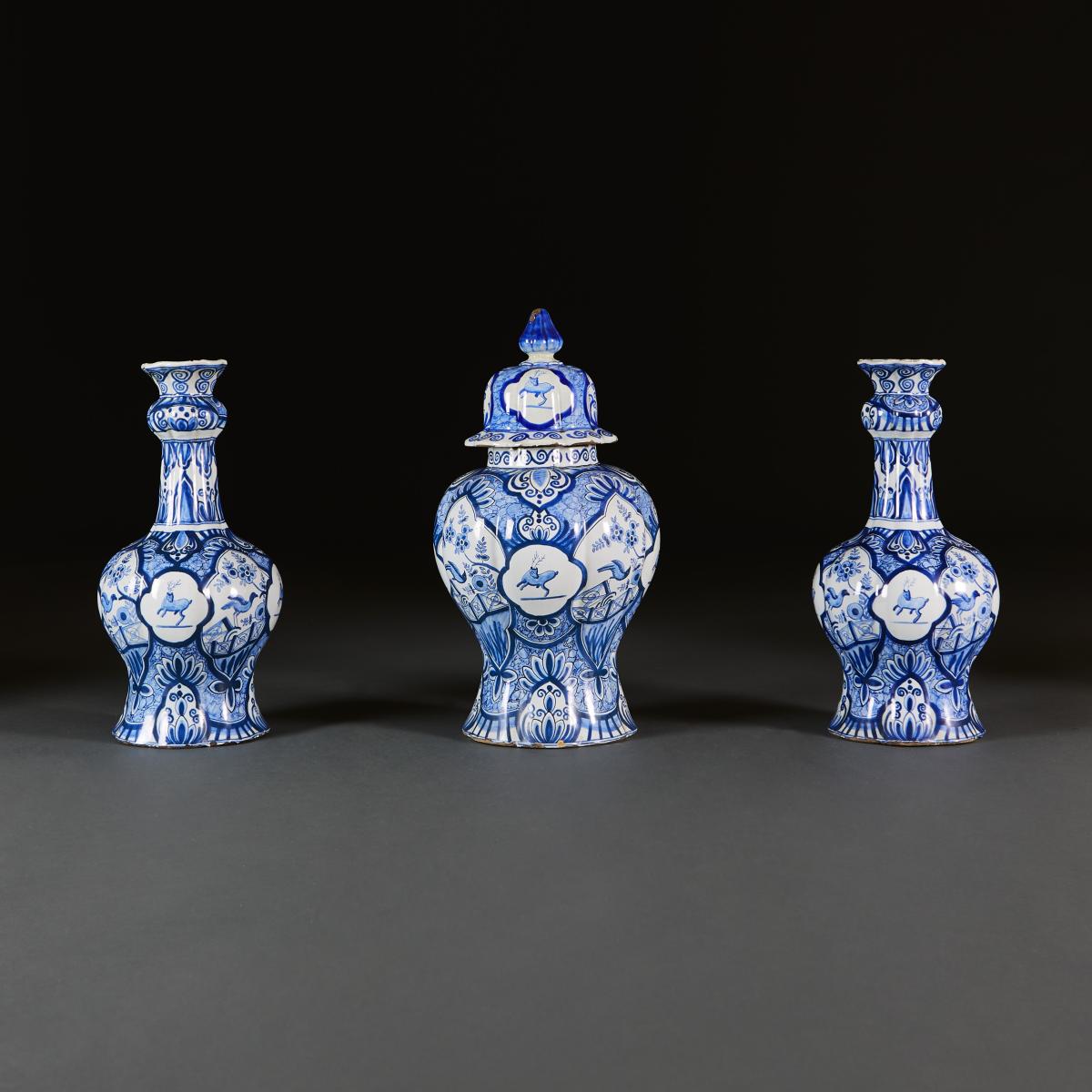 A Blue and White Delft Three Piece Garniture