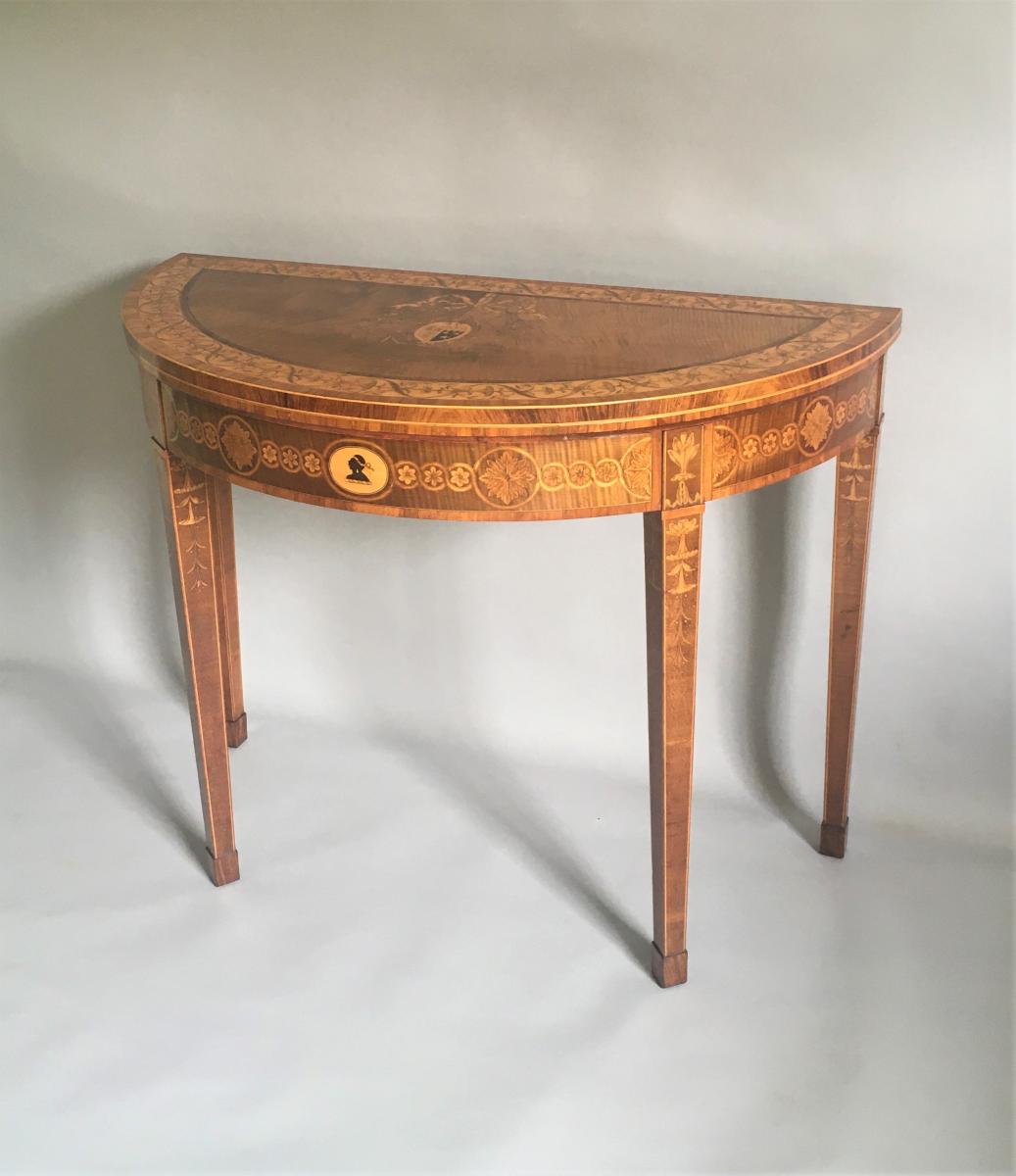 A GEORGE III SYCAMORE, TULIPWOOD, ROSEWOOD AND MARQUETRY CARD TABLE CIRCA 1780-90. IN THE MANNER OF MAYHEW & INCE.