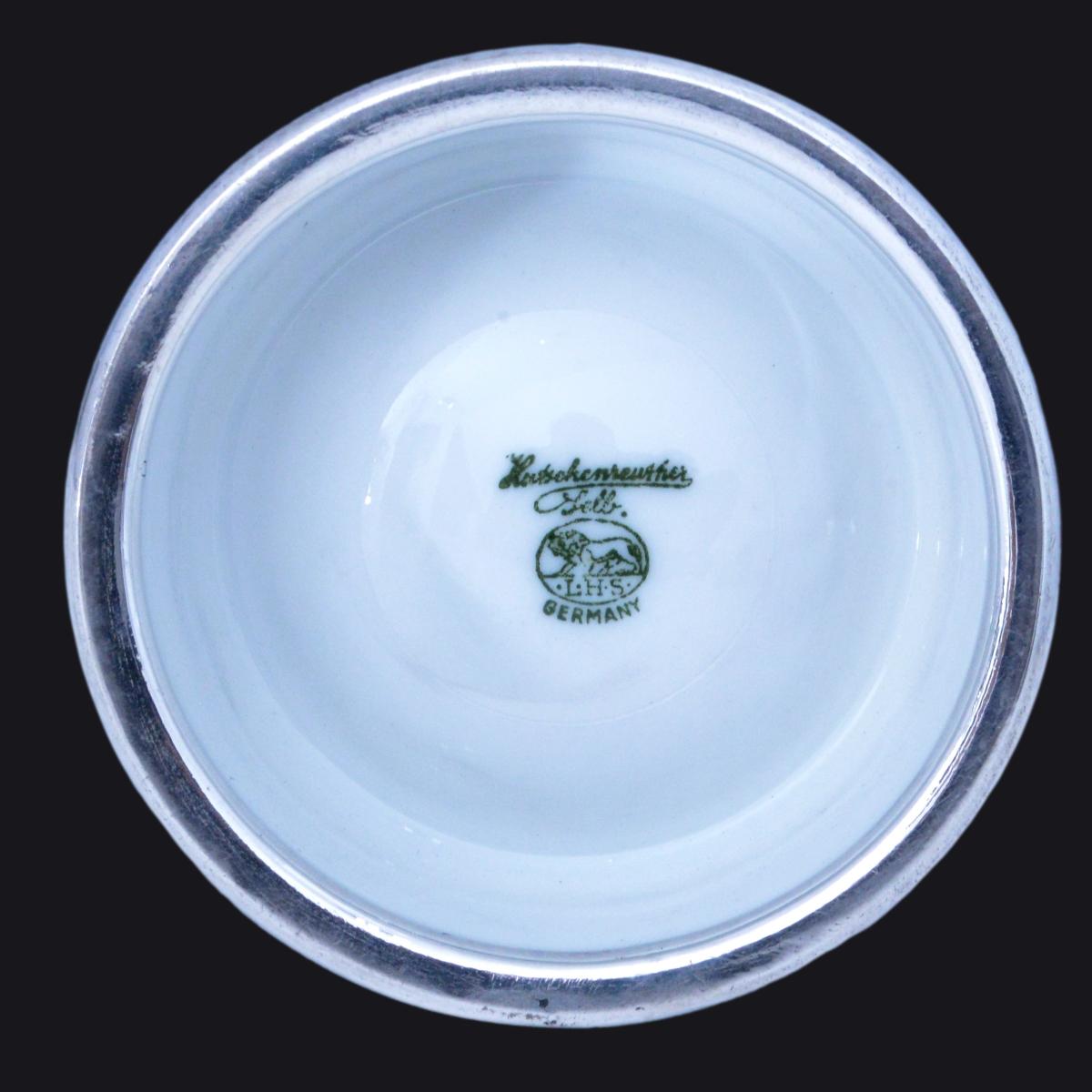 A pair of Friedrich Spahr silver overlay porcelain salts