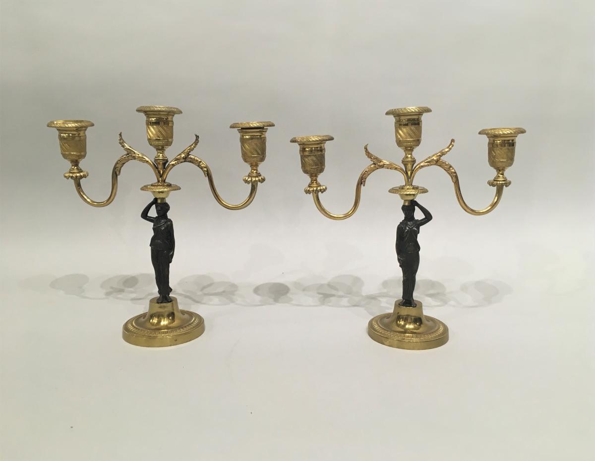 A  SMALL PAIR OF FRENCH EMPIRE FIGURAL BRONZE & ORMOLU CANDLEABRA