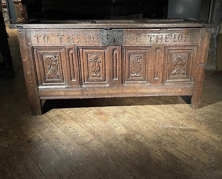 A RARE HENRY VIII OAK INSCRIBED PANELLED CHEST