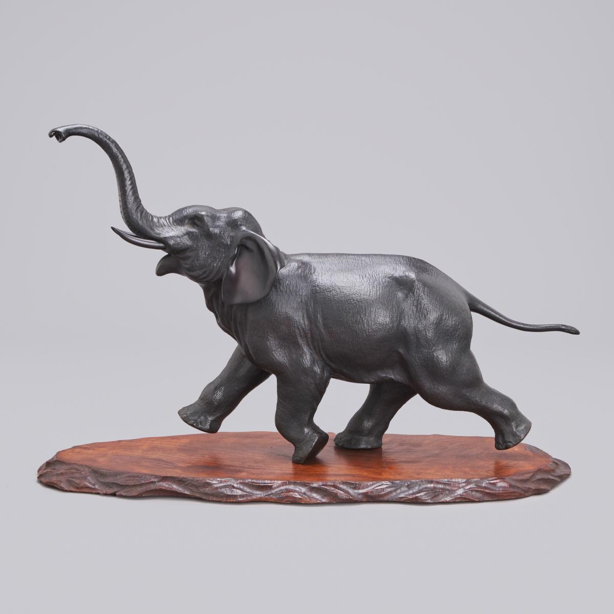 Japanese bronze running elephant signed Miyabe Atsuyoshi and Maruki, Meiji Period