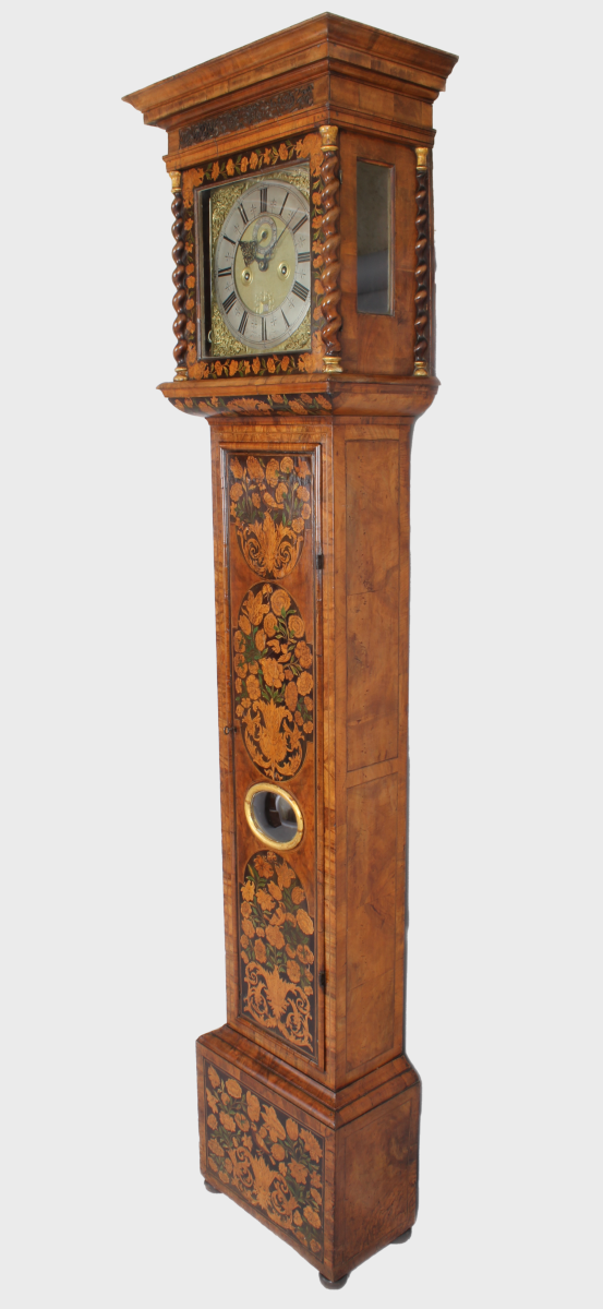 walnut marquetry long-case clock with a bow-fronted glass lenticle