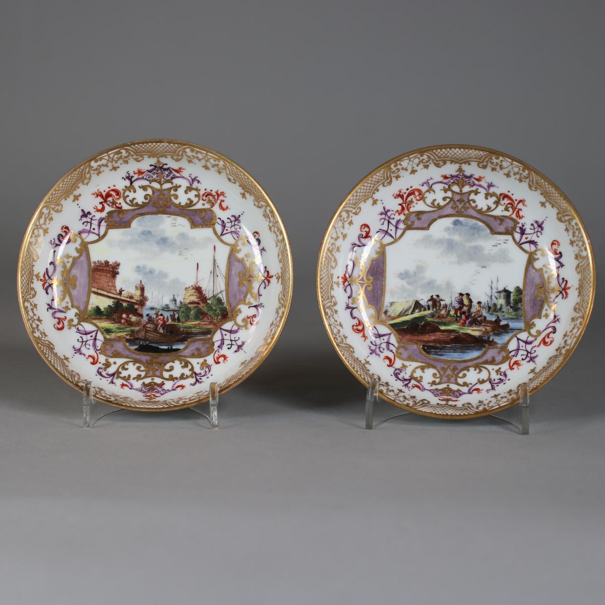 Pair of Meissen saucers with watery landscapes