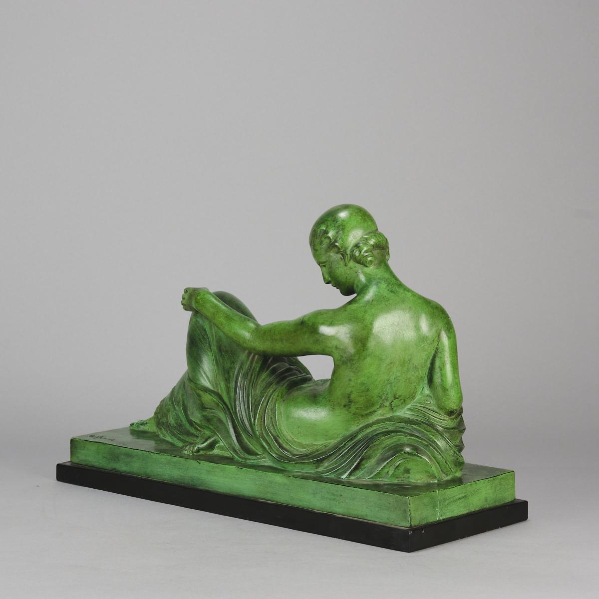 Early 20th Century Patinated Bronze entitled "Femme Allongée" by Gaston Béguin