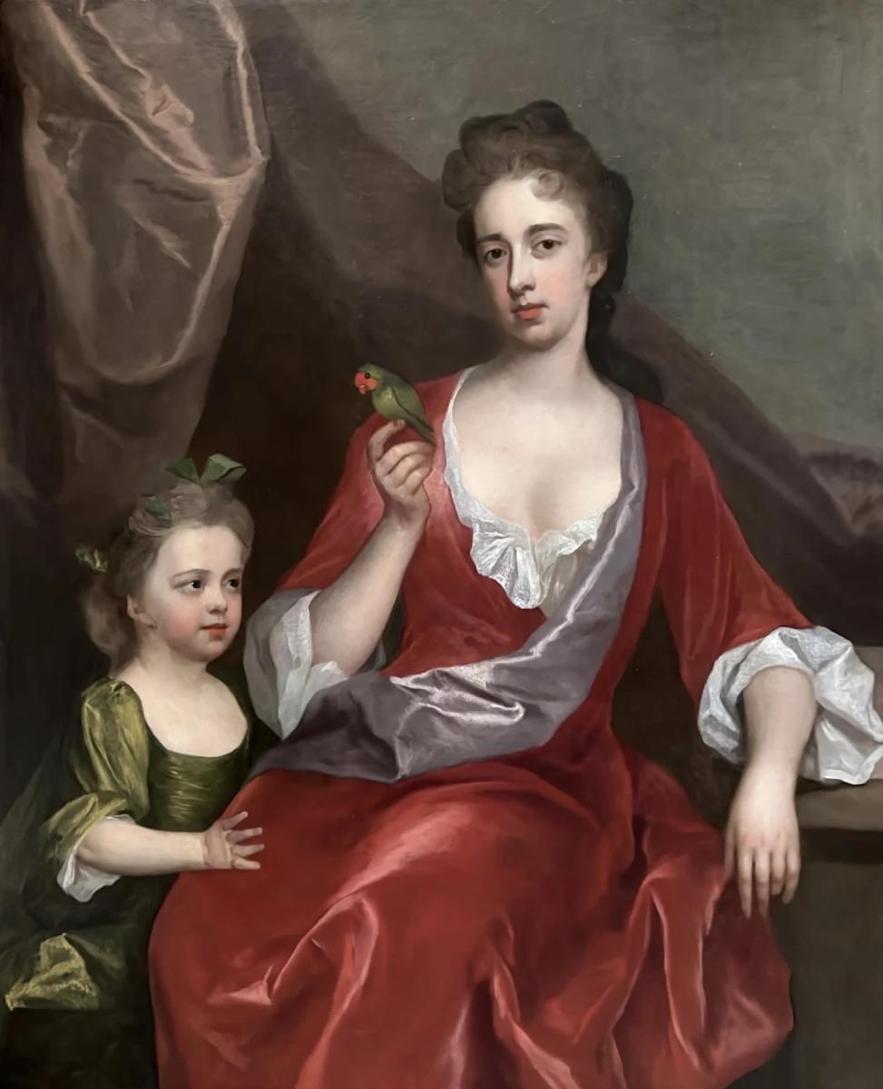 18th century portrait of a lady and her daughter with an exotic bird by Michael Dahl