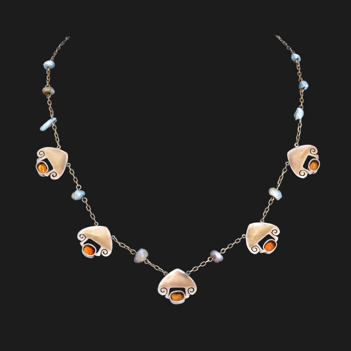 An Archibald Knox gold and citrine necklace