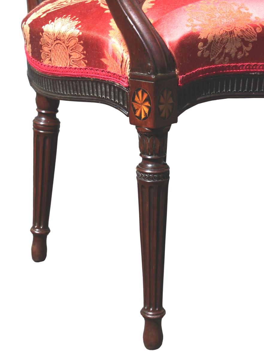 George III mahogany armchairs in red damask; manner of John Linnell