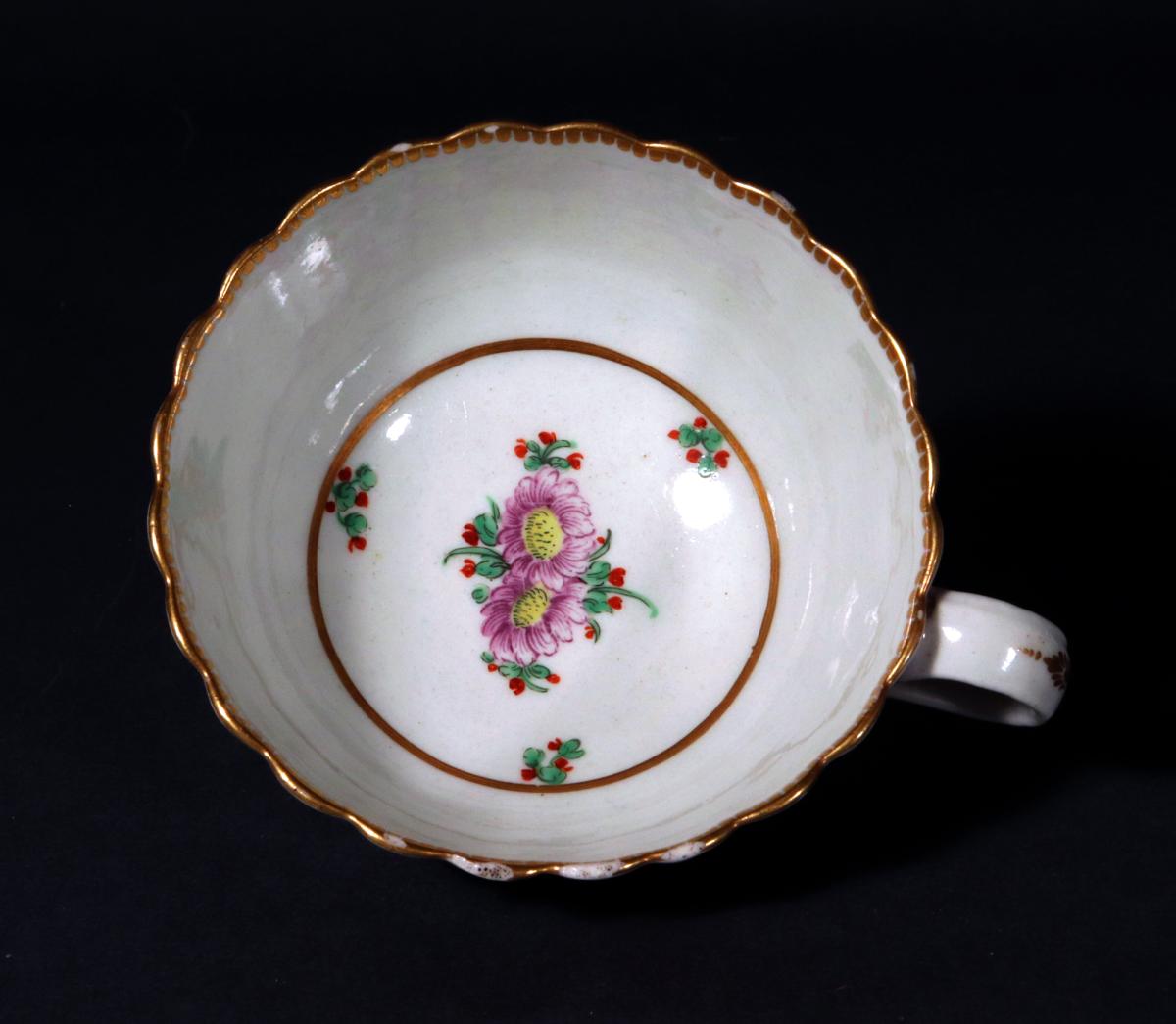 First Period Worcester Porcelain "Holly Berry" Pattern Teacup and Saucer, Hop Trellis Pattern, Circa 1775.