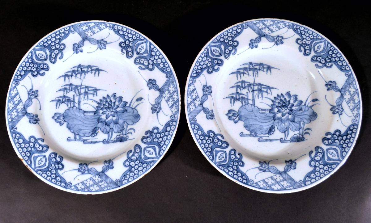 English Delftware Plates decorated in Underglaze Blue with Lotus Flowers, Probably London