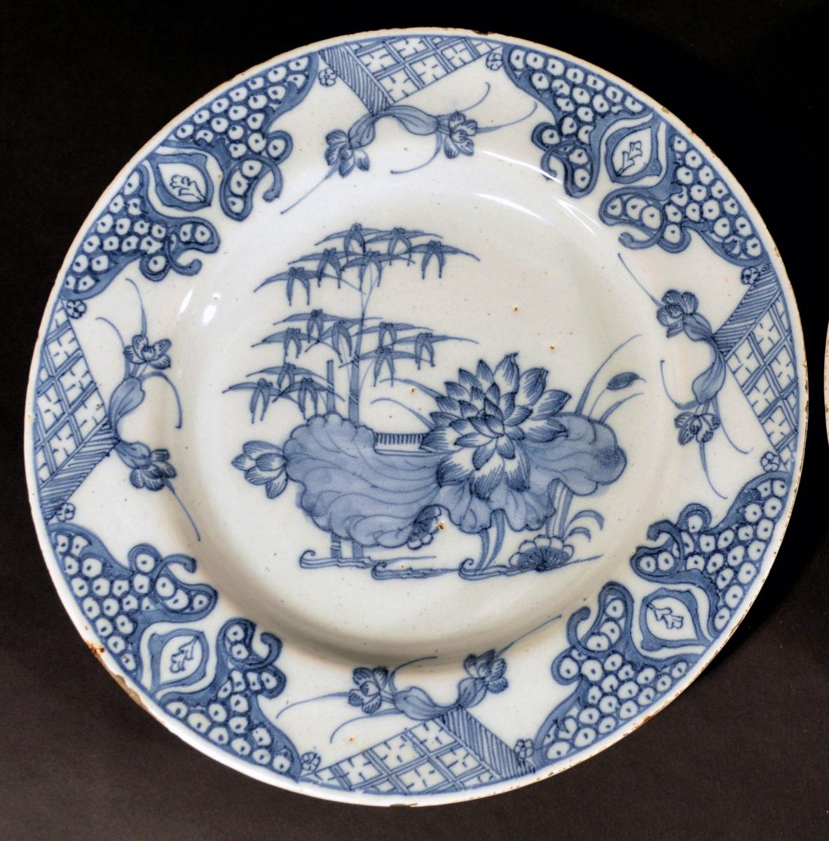 English Underglaze Blue Delftware Plates decorated with Lotus, Probably London, Circa 1760.