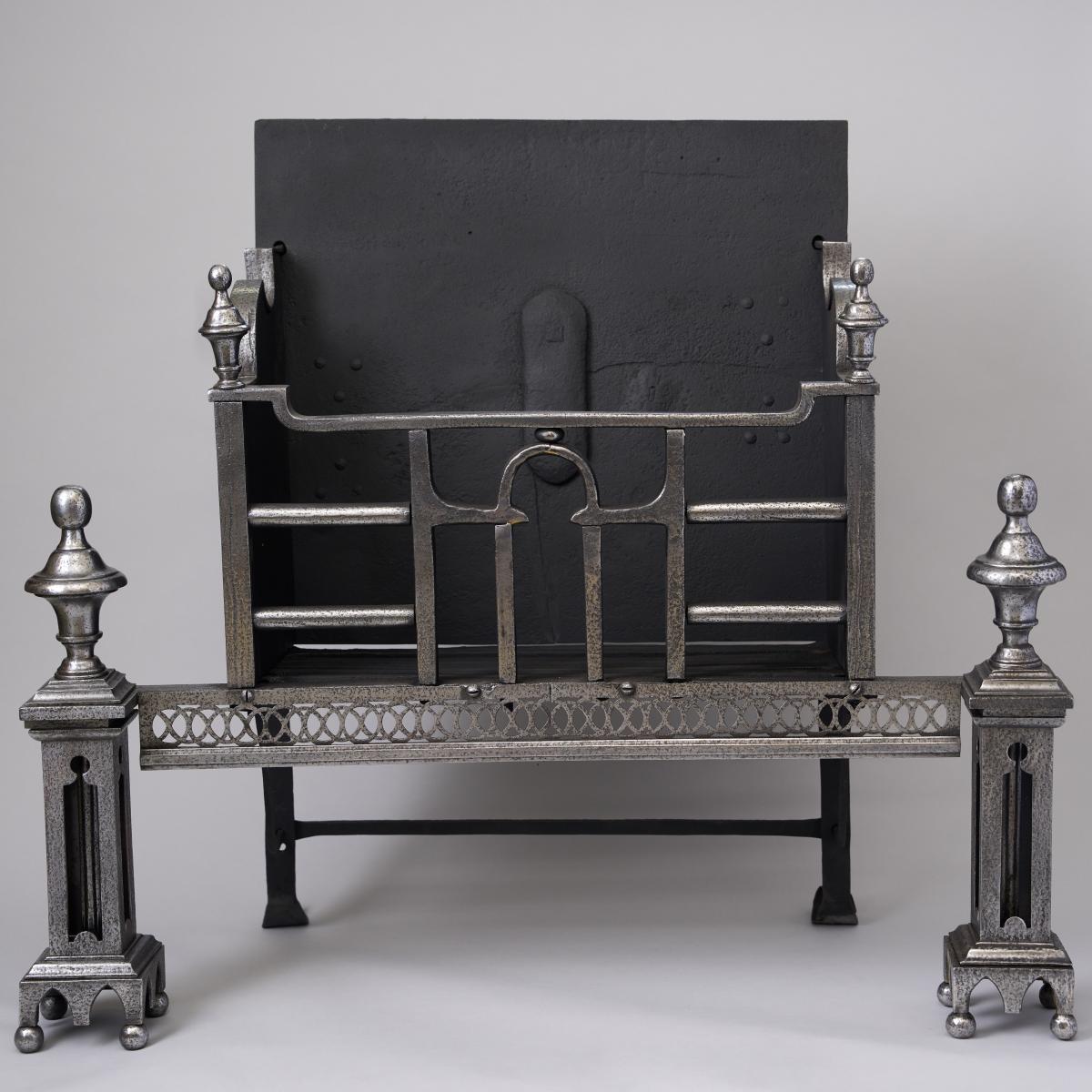 A n 18th century English wrought and cast iron coal grate
