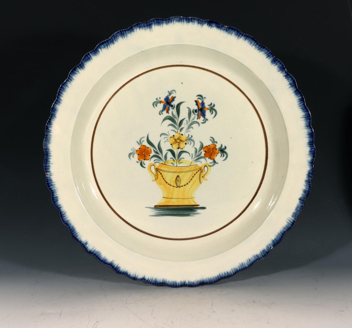 English Creamware Pottery Large Shell-edge Dish with Prattware Decoration of Flowers in Urn, Circa 1800-1810