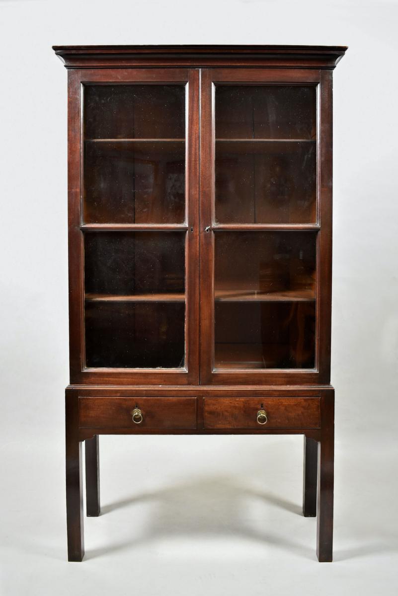 George II mahogany glazed door cabinet on stand in original condition, c.1740