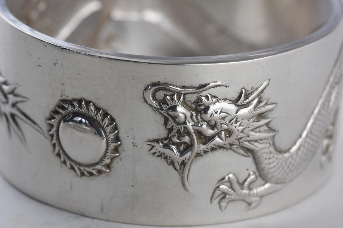 Chinese export silver butter dish finely decorated with 4 toed dragons chasing a flaming ball