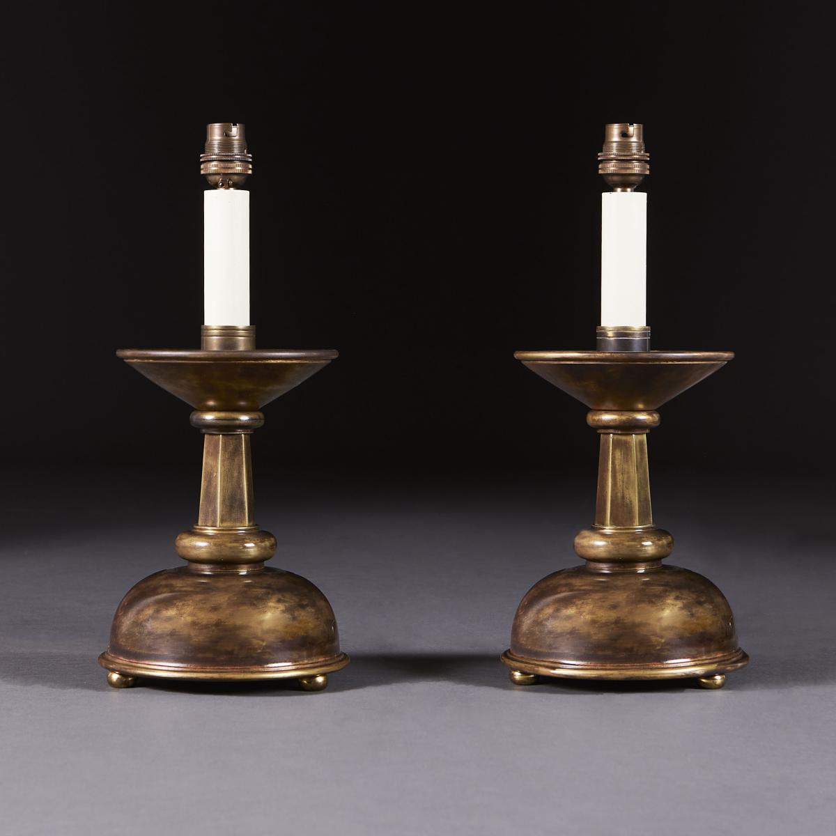 A Pair of Arts and Crafts Brass Lamps