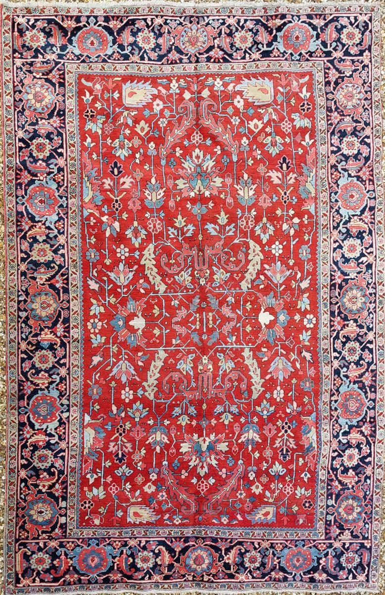 antique Persian Heriz carpet with an allover design