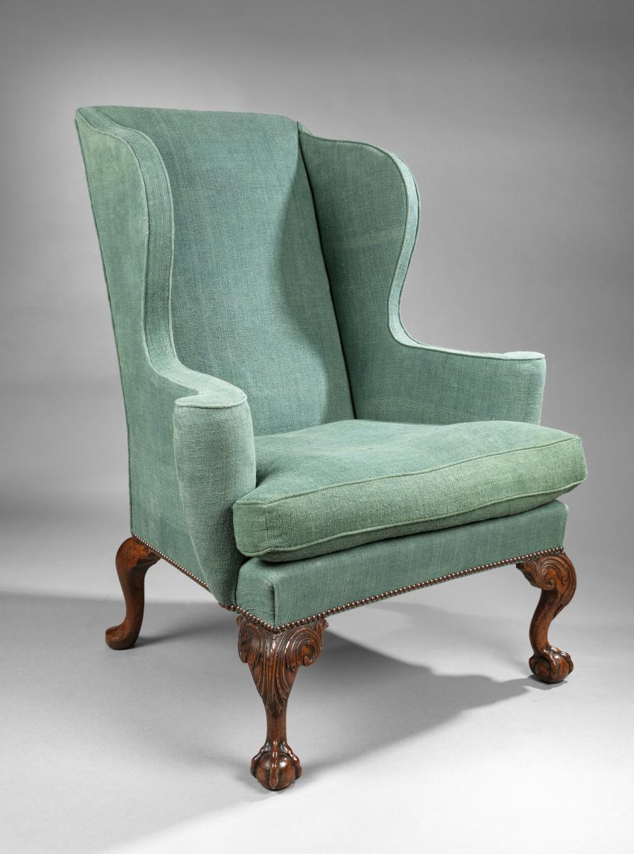 George II carved walnut wing armchair
