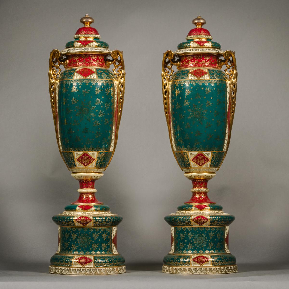 A Large Pair of Vienna Style Porcelain Vases and Covers.  Bohemia, Circa 1900.