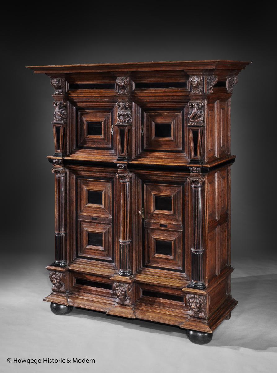 Large Carved Oak and Ebony Statue Cabinet, circa 1620
