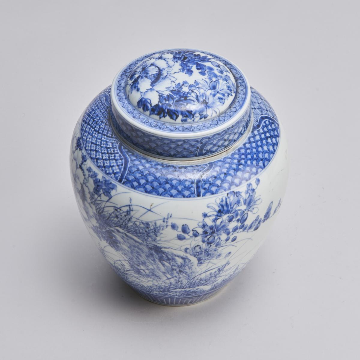 An unusual Japanese porcelain blue and white jar with inner stopper (19th Century)