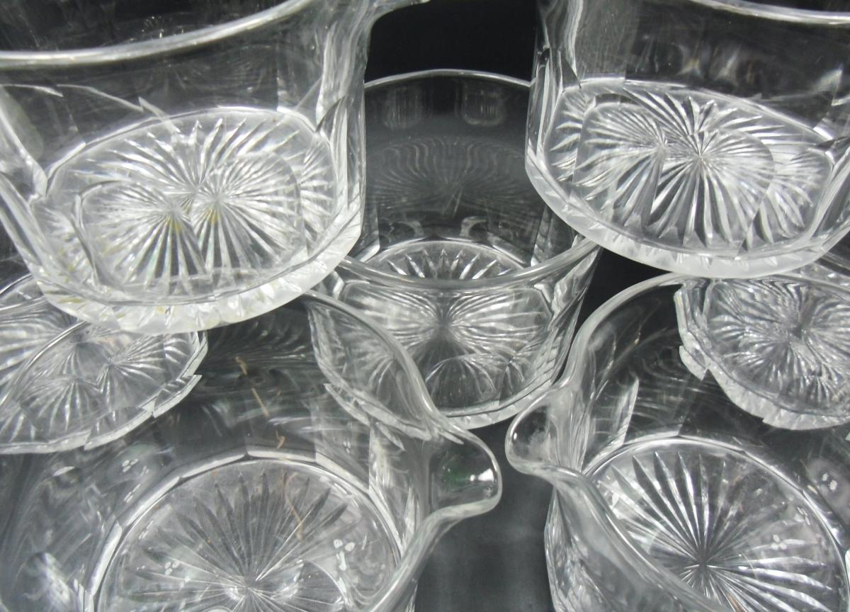 Set of eight Regency period crystal glass wine rinsers with panel cut sides