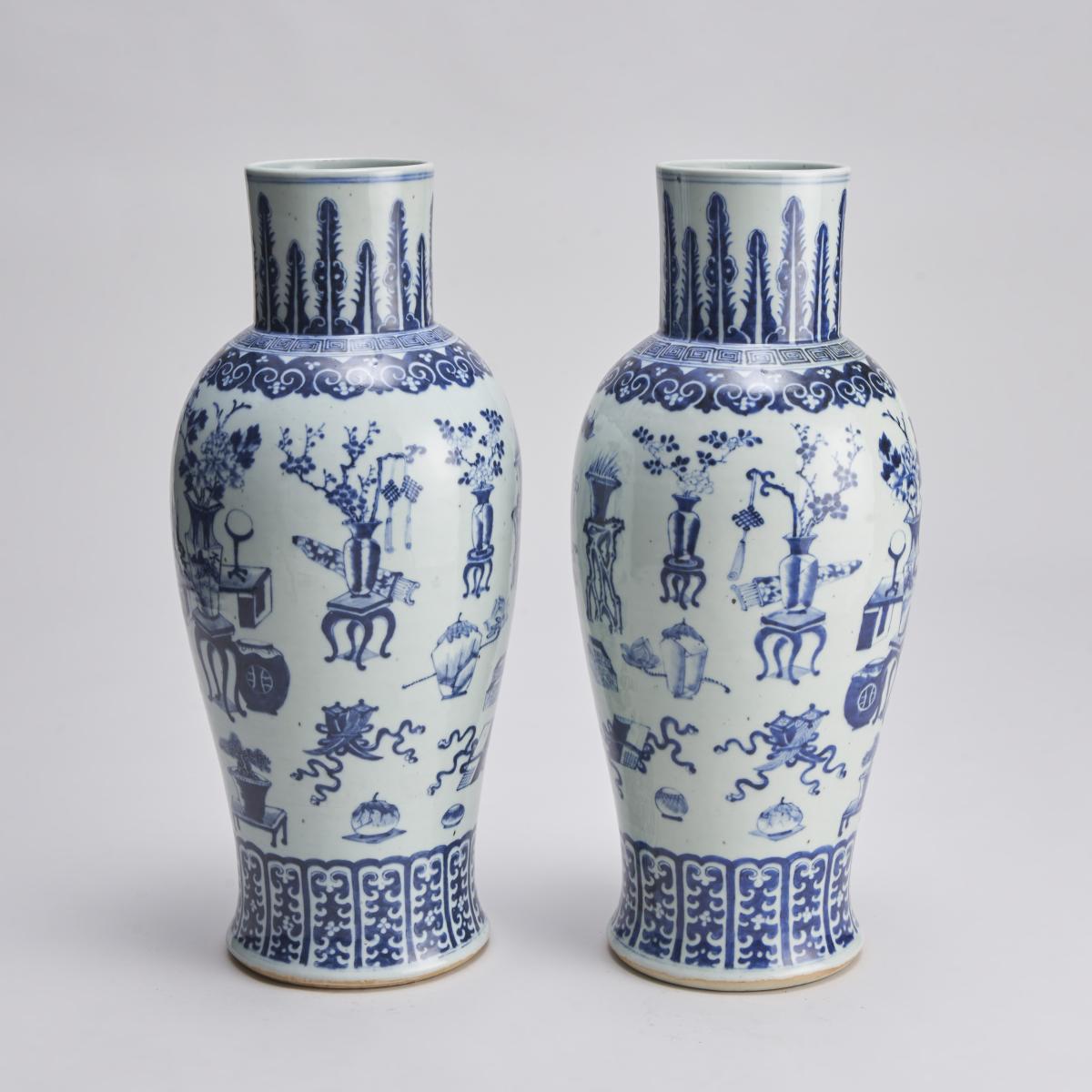 An imposing (59cm in height) pair of Nineteenth Century baluster-form blue and white vases
