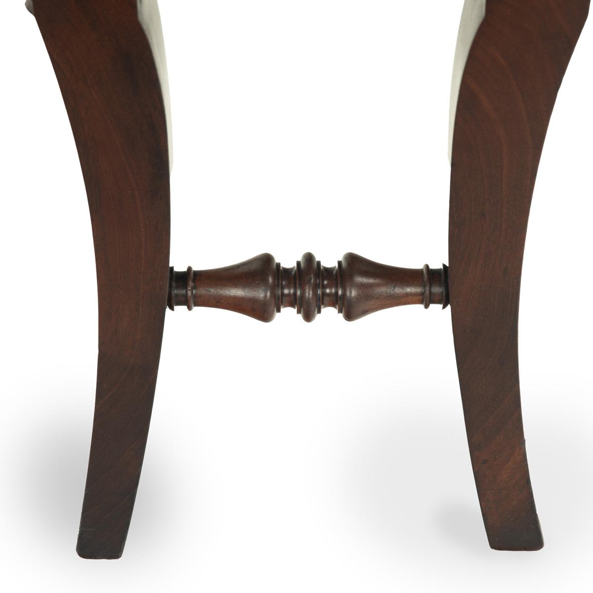 Regency mahogany armorial hall chairs