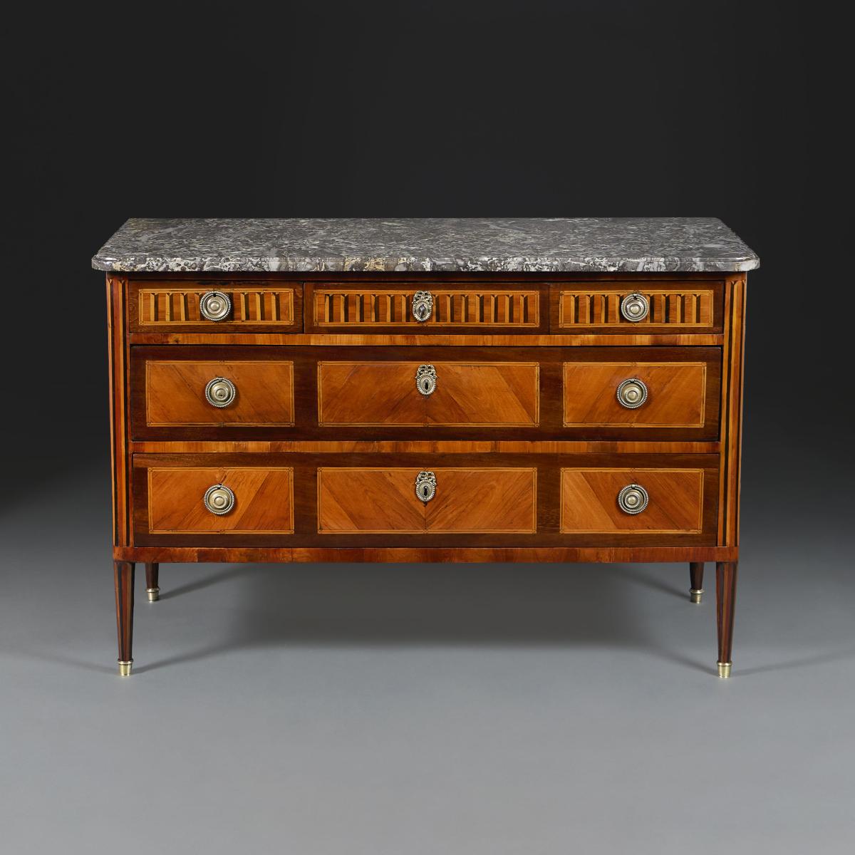 A Louis XVI Tulip Wood Parquetry Commode
