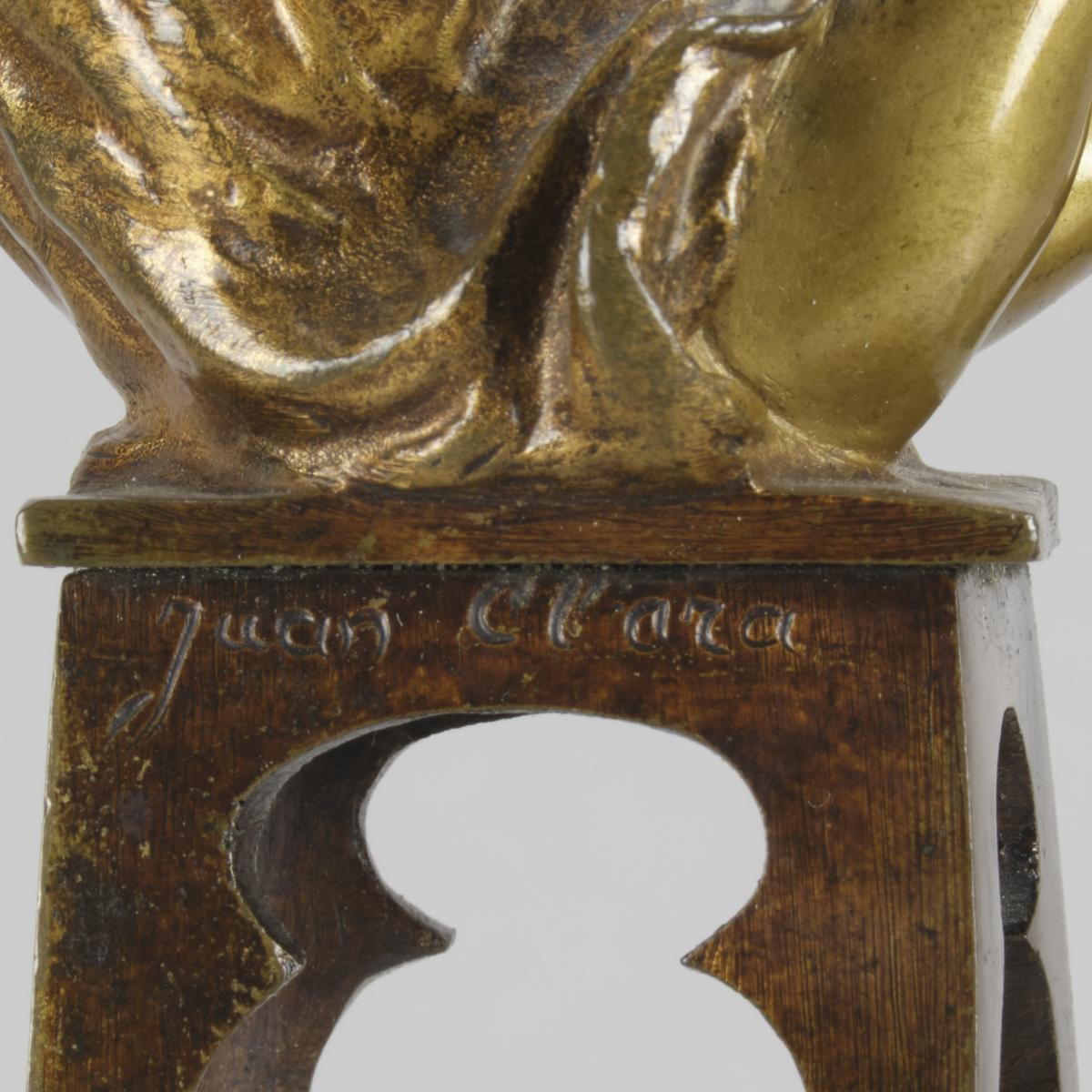 Early 20th Century Bronze Sculpture entitled "Girl Putting on her Shoe" by Juan Clara