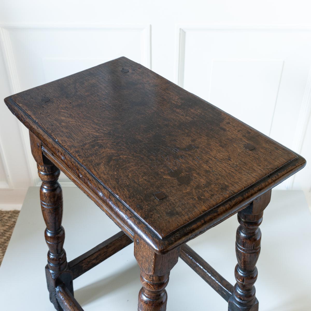 A Charles I oak joint stool, circa 1640