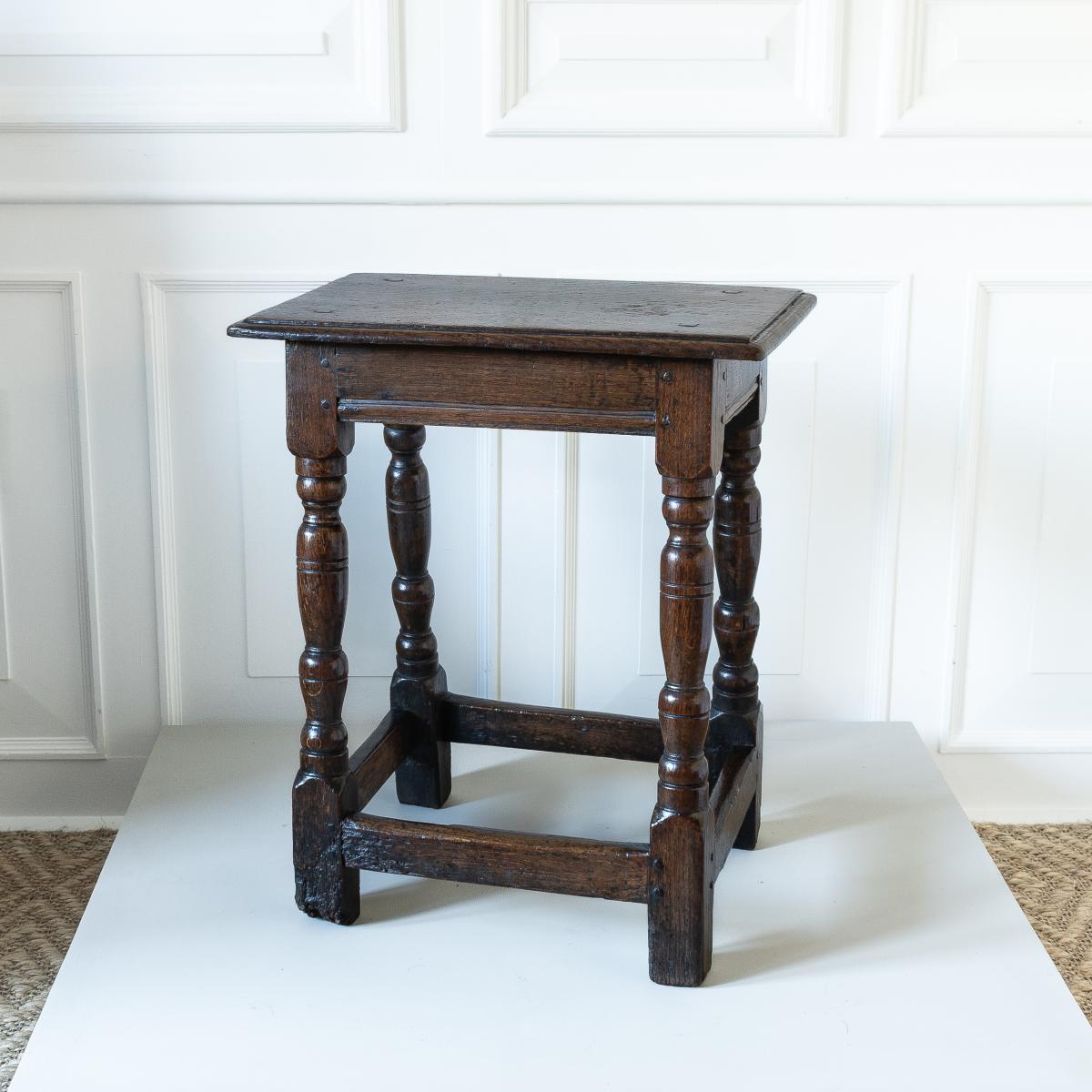 A Charles I oak joint stool, circa 1640