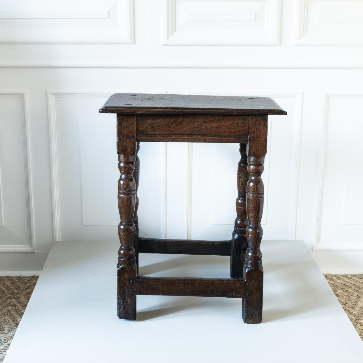 A Charles I oak joint stool, circa 1640