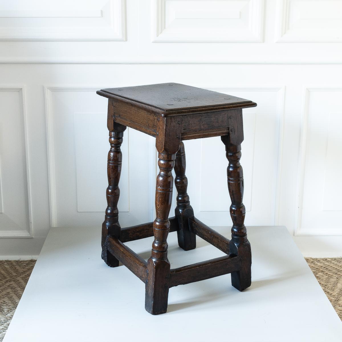 A Charles I oak joint stool, circa 1640