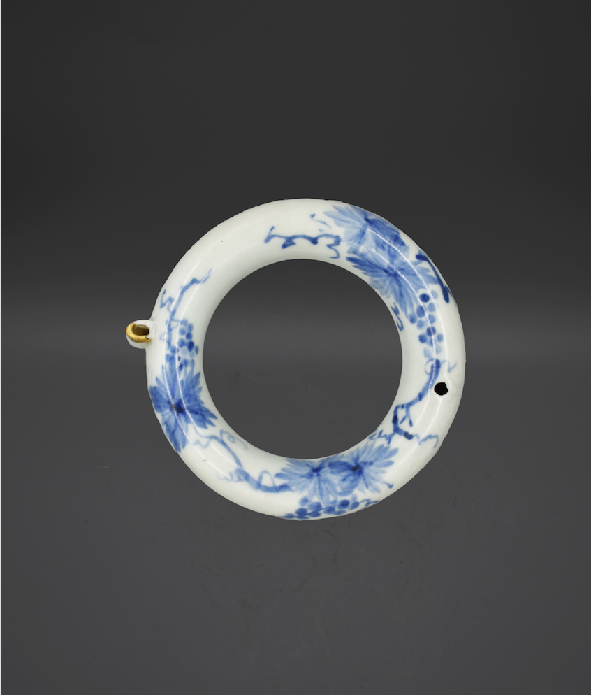 Blue And White Ring-Shaped Water Dropper