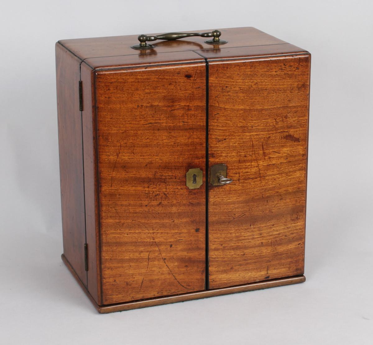 Early 19th century mahogany apothecary cabinet