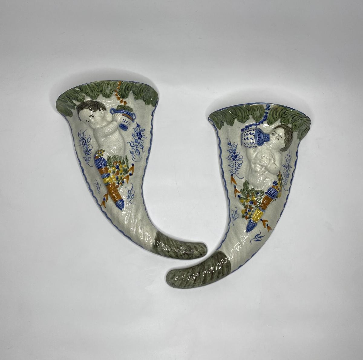 Pair Prattware Cupid pottery wall pockets, circa 1810