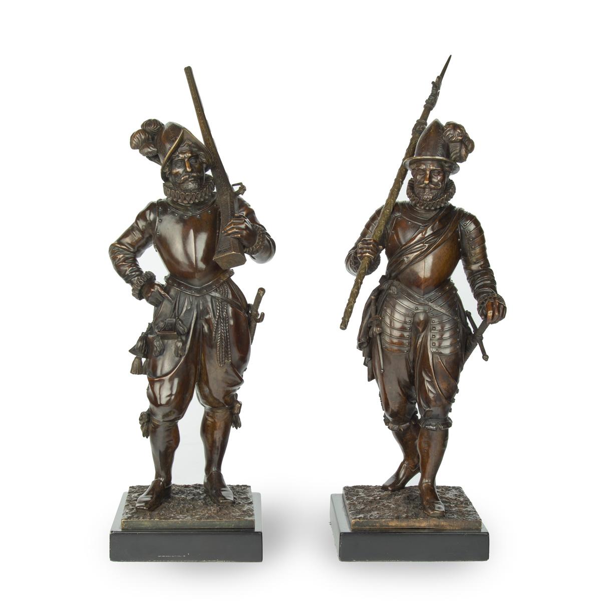 bronze standing figures of Conquistadors