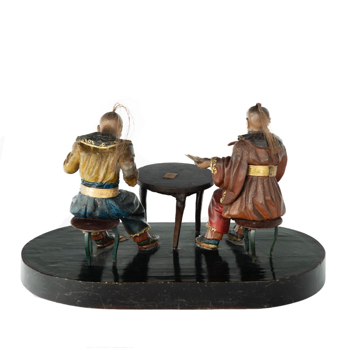 Anglo-Chinese Regency polychrome painted wax and wood group
