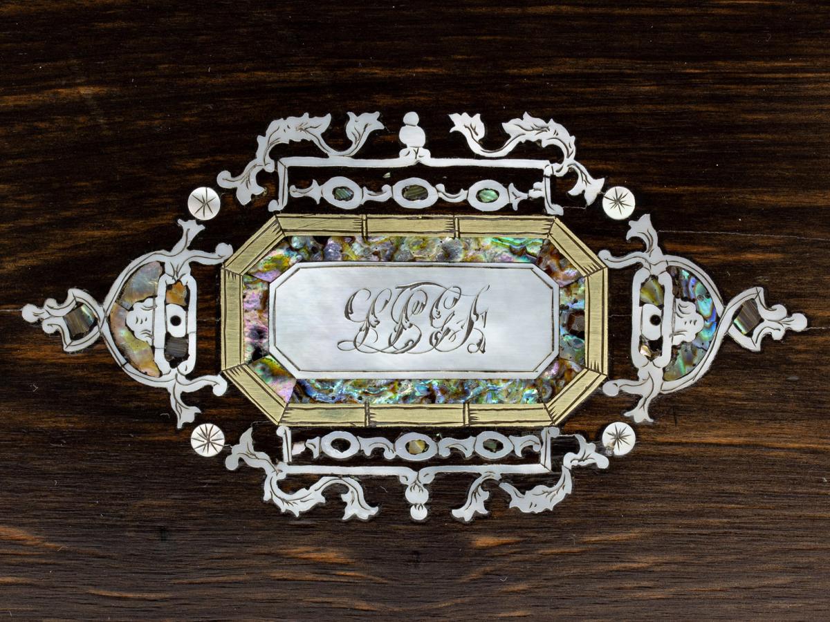 Close up of the mother of pearl initial plaque