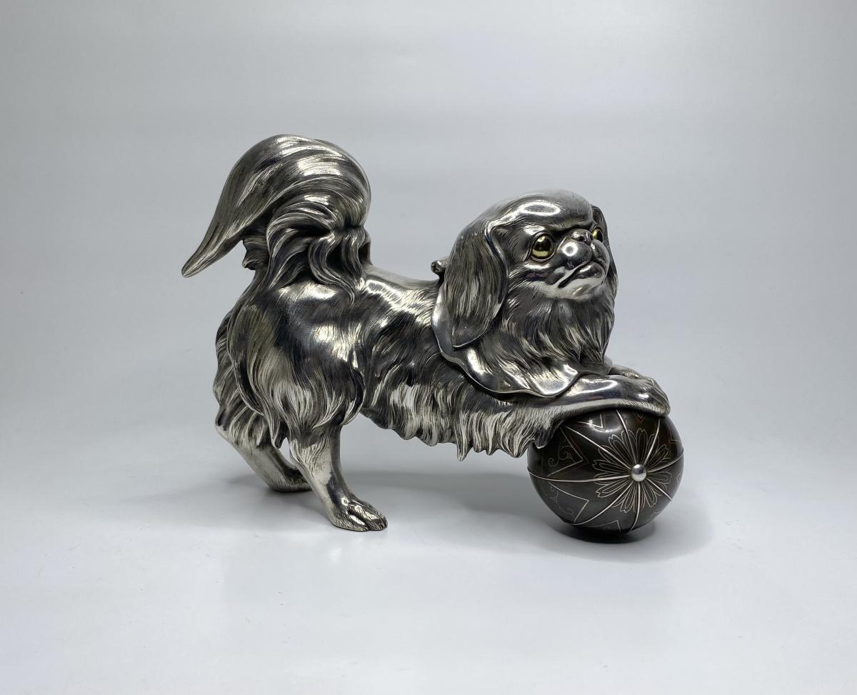 Silvered bronze okimono of a Chin puppy, Japan, Meiji Period