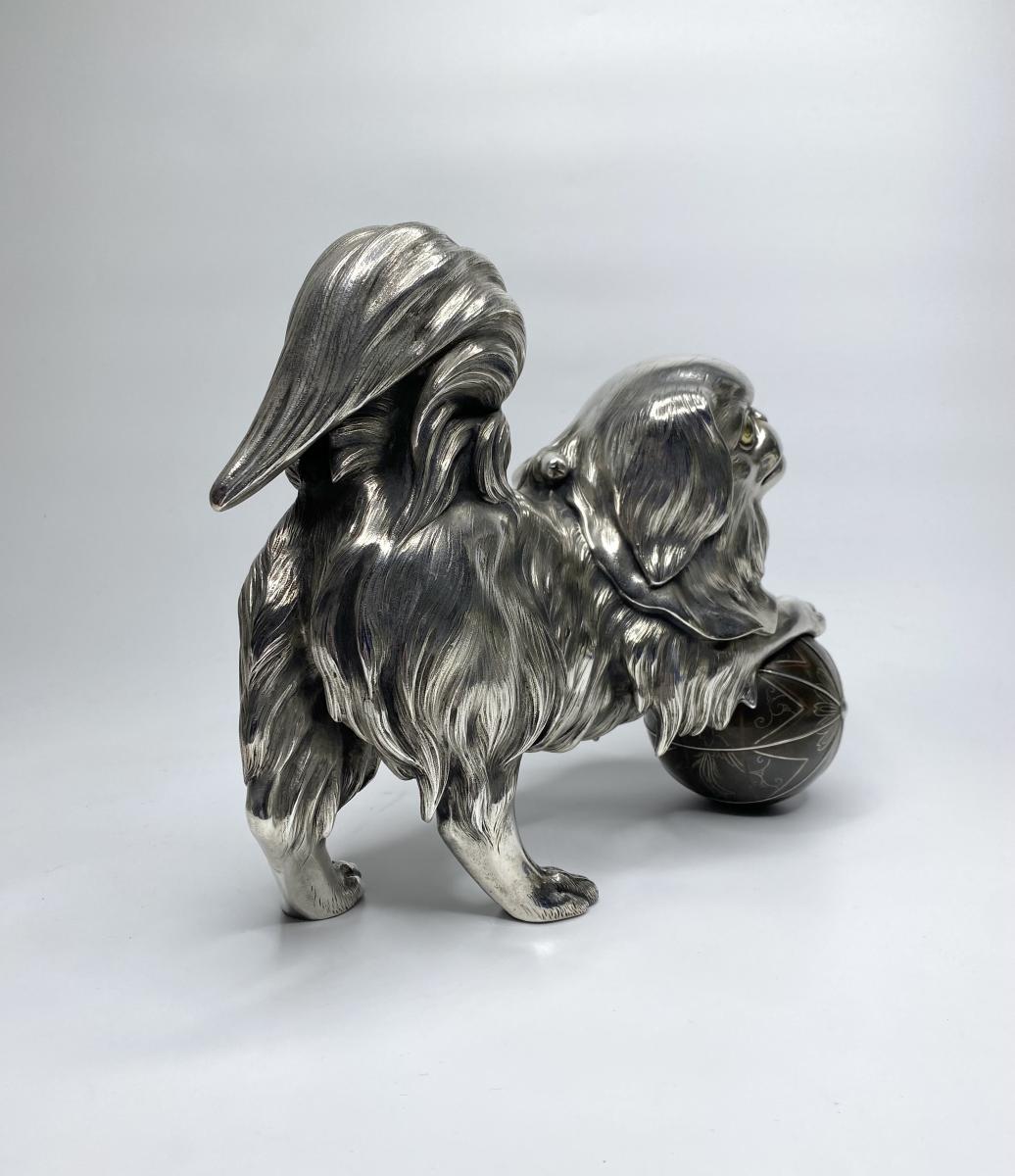 Silvered bronze okimono of a Chin puppy, Japan, Meiji Period