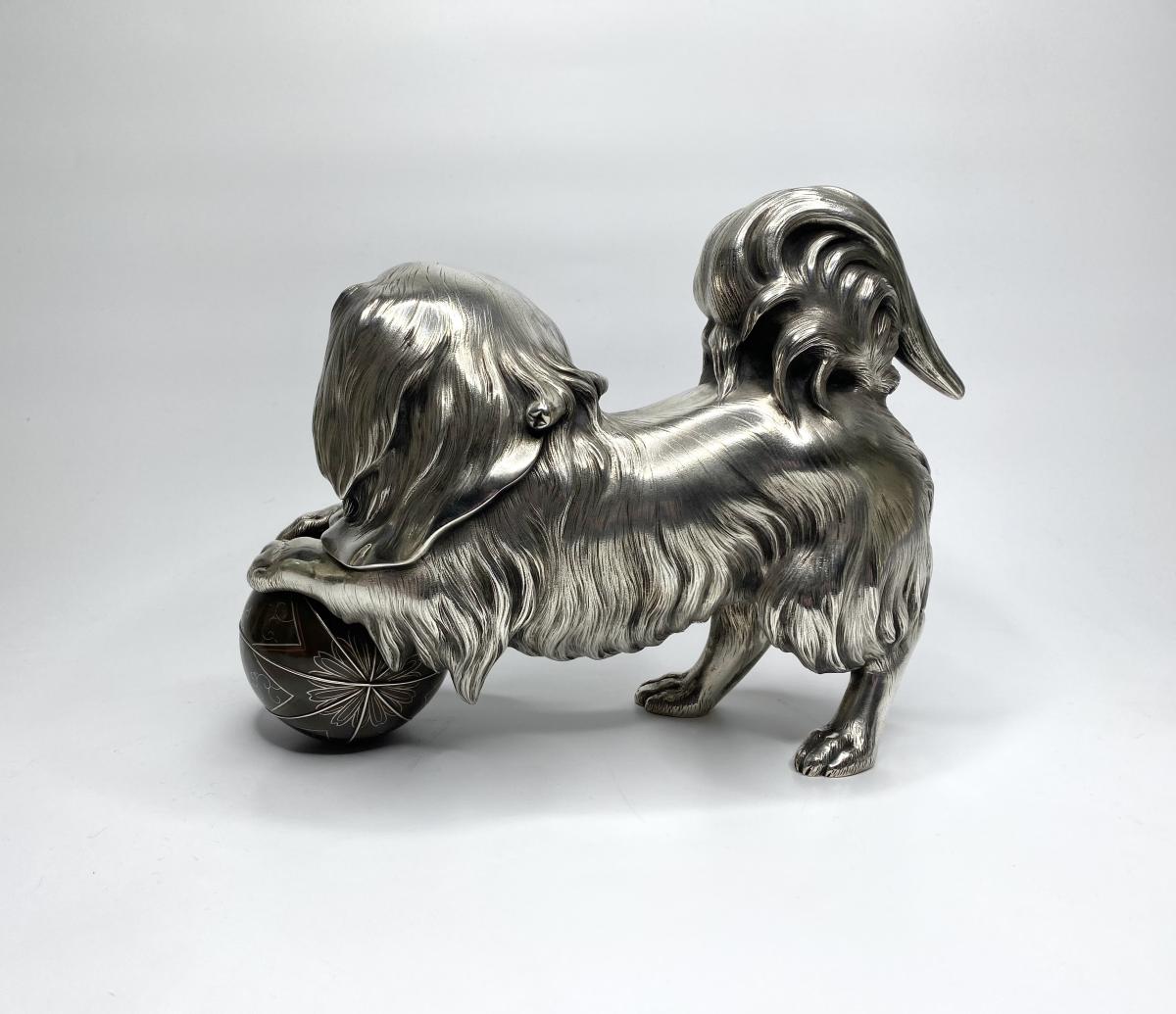 Silvered bronze okimono of a Chin puppy, Japan, Meiji Period