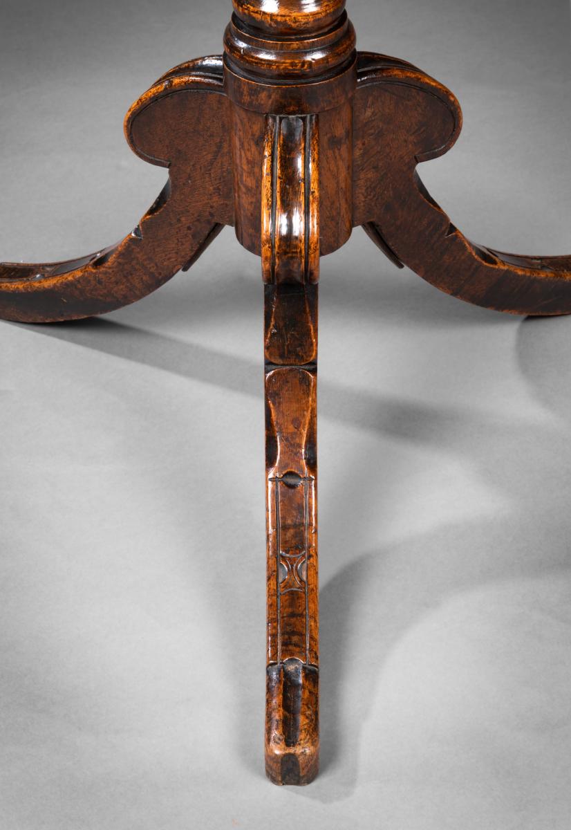 Regency carved oak tripod table