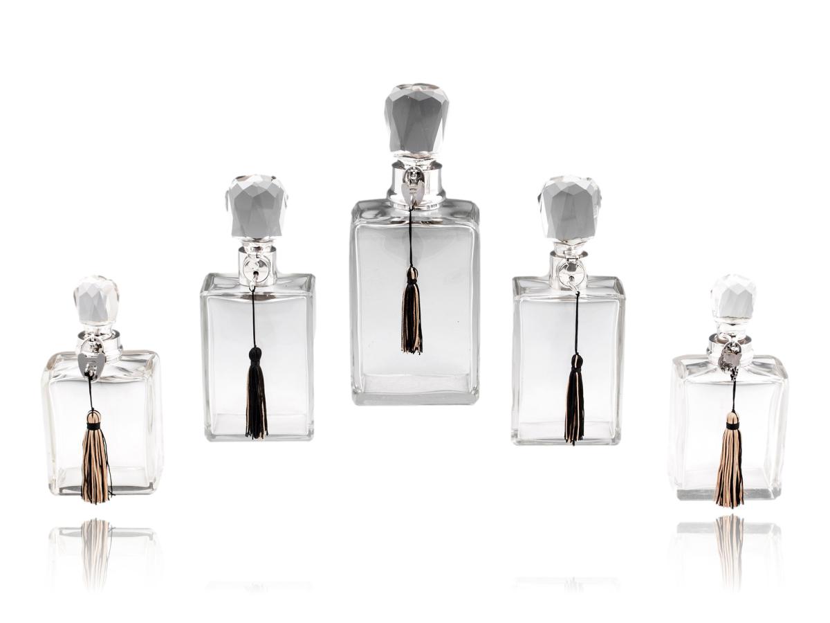 Overview of the five decanter bottles with the keys inserted