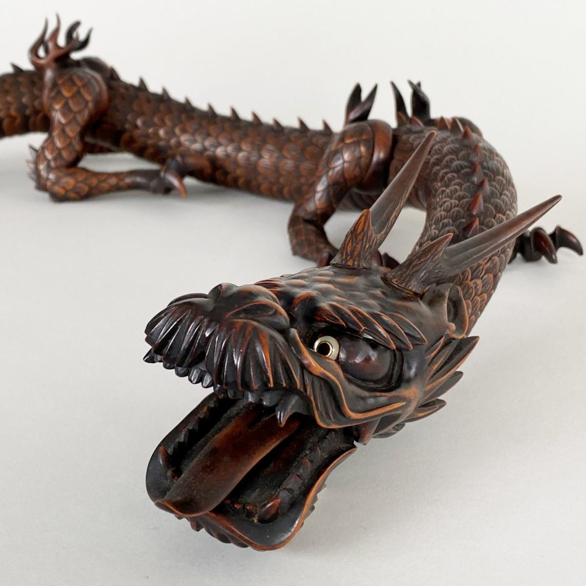A wonderful, fully articulated (Jizai) wood-carved Okimono of a
