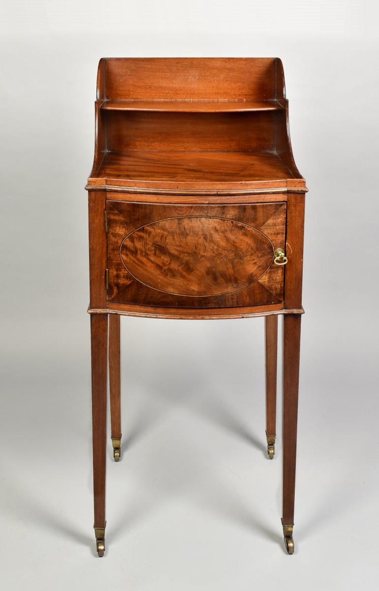 Pair George III bow fronted mahogany bedside tables, circa 1800