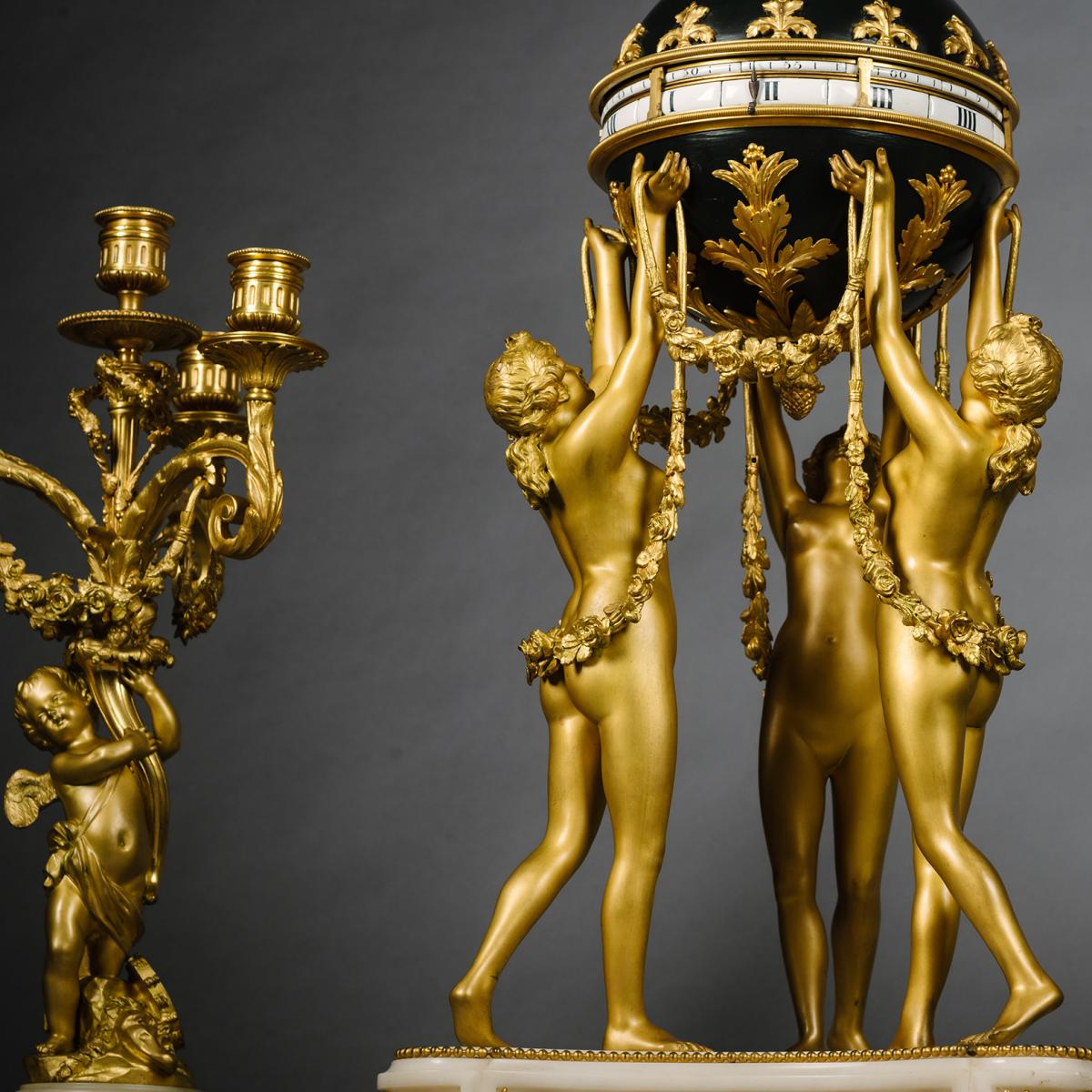 Louis XVI Style Gilt and Patinated Bronze and Marble Clock Garniture